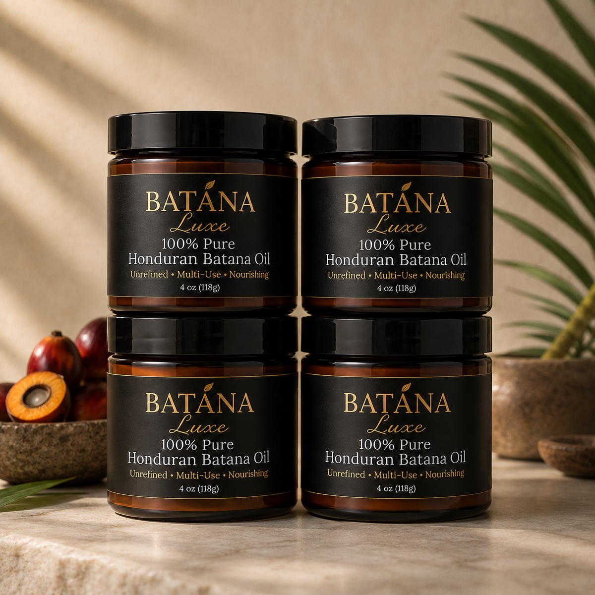Four jars of Batana Luxe 100% Pure Honduran Batana Oil with batana palm fruit
